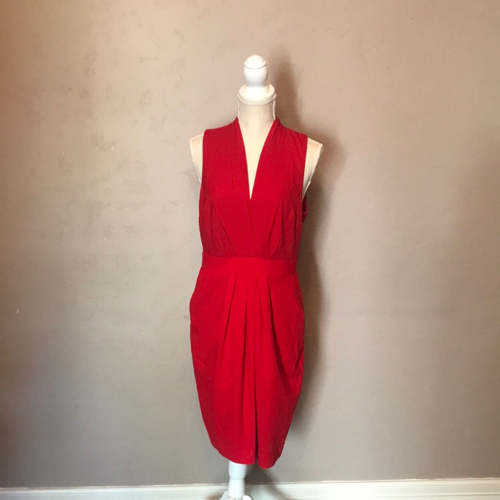 Red sleeveless dress with pockets. Great for date night. New with tags